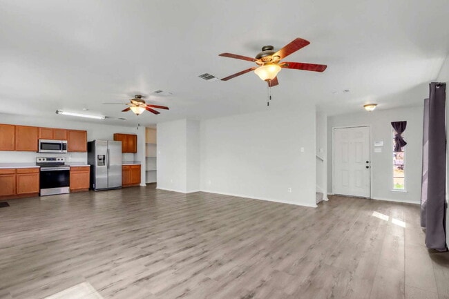 Building Photo - "Spacious 4-Bed, 3-Bath Retreat with Solar Panels!"