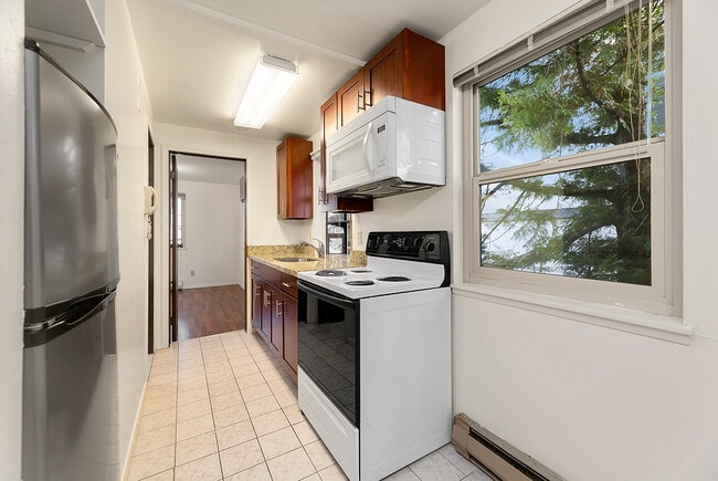 Building Photo - 4230 8th Ave NE