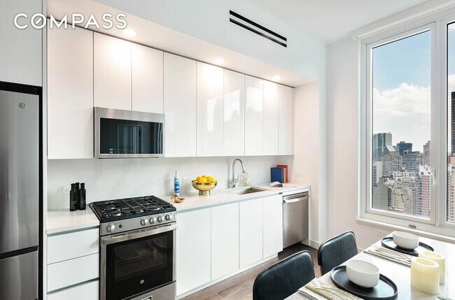 Foto del edificio - 232 E 54th St