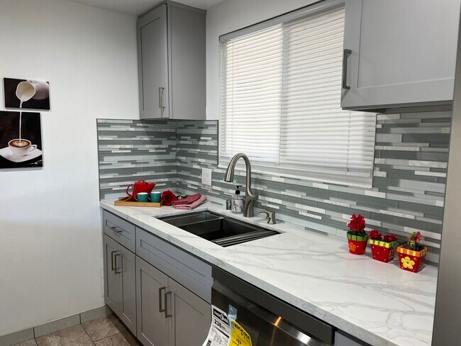 New ss sink with accessories. Beautiful backsplash. - 1119 Reed Ave