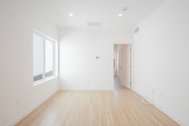 Interior Photo - Modern Luxury Living in Hollywood: Top-Floor Corner with Wraparound Balcony