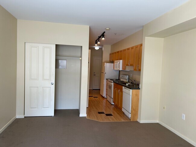 Building Photo - 118 107th Ave NE Unit B210