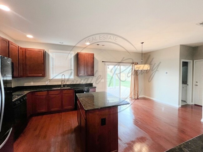 Photo - Three Bedroom, Fully Fenced Two Story with a Community Pool & Fitness Center! House