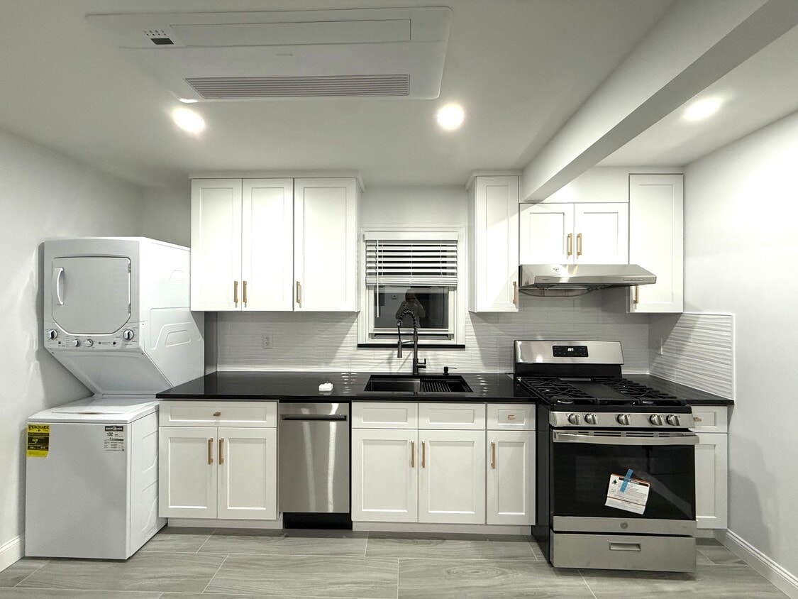 Unit 2 Kitchen with In Unit Washer and Dryer - 3334 208th St