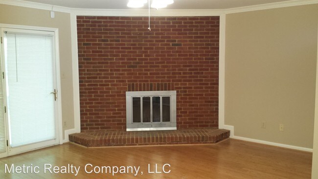 Building Photo - 8443 Coulwood Oak Ln