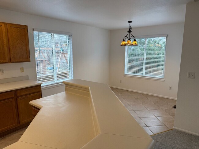 Building Photo - Spacious 4-Bedroom Ranch with Finished Bas...