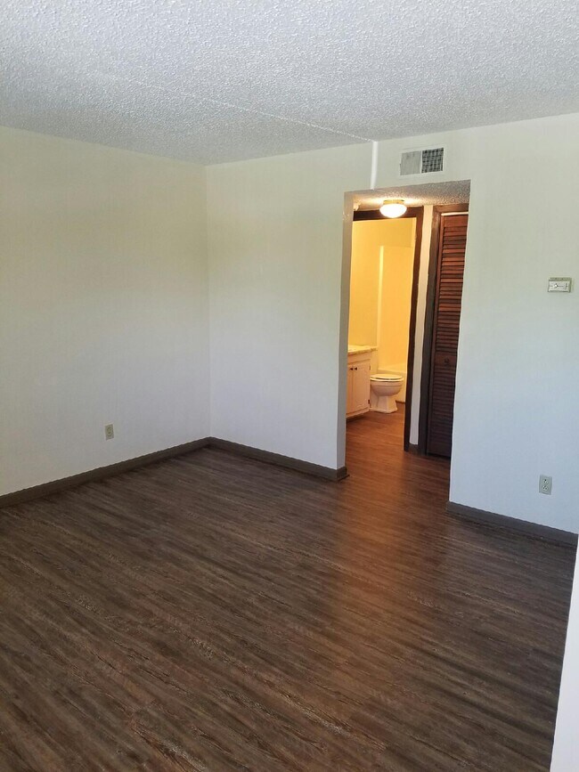 Living Room/Hall - 332 Forestal Dr Apartments