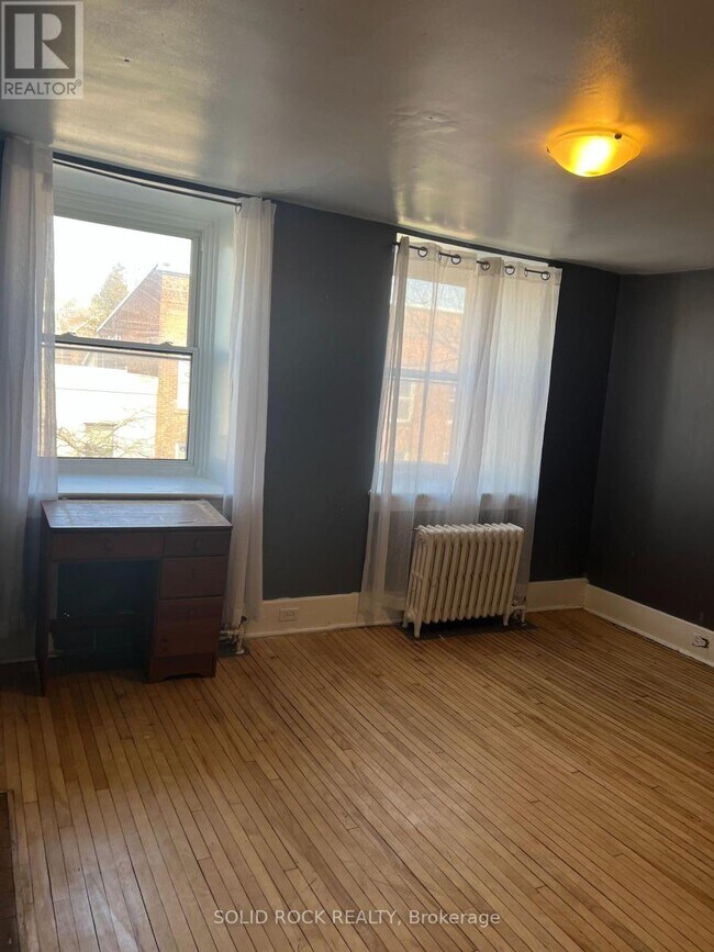 Photo du bâtiment - 89 King St W