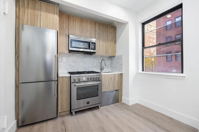 Foto del edificio - 138 E 38th St