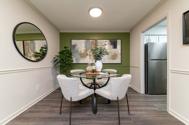 Dining area with hardwood-style flooring & overhead lighting - Vetra Belle Meade