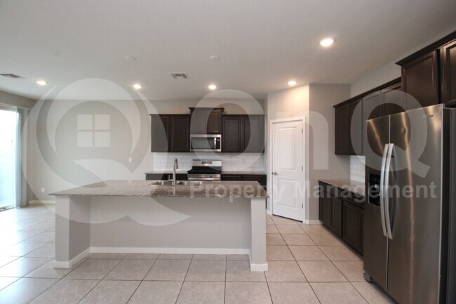 Building Photo - 7043 E Gamebird Way