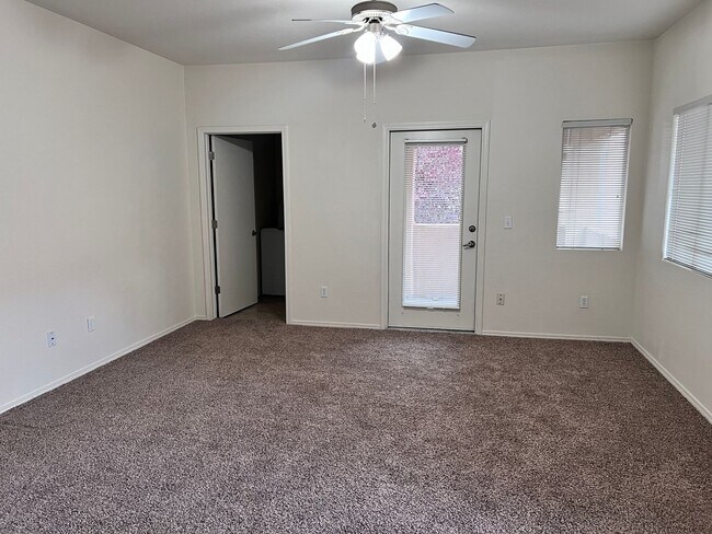 Building Photo - Wonderful 3 Br condo in gated community with the major appliances and 1 car garage.
