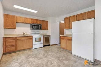 Building Photo - 1810 E 72nd Ave