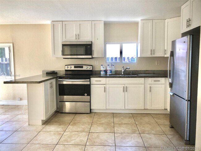 Building Photo - 1547 NW 66th St