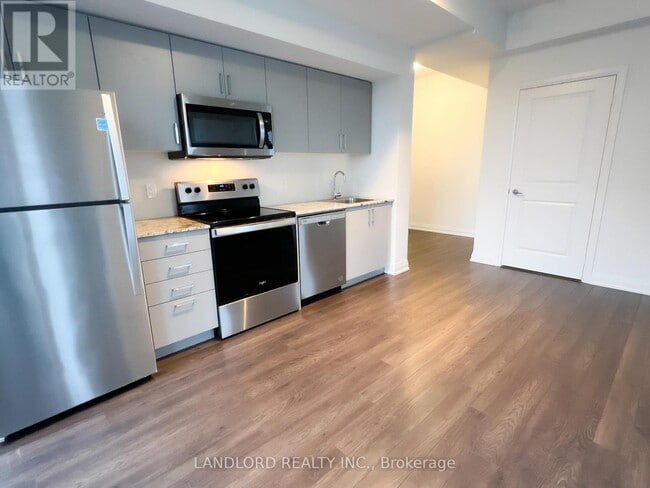 Building Photo - 10-1210 Meadowglen Pl