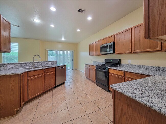 Foto del edificio - 11034 Dellrose Crossing Dr