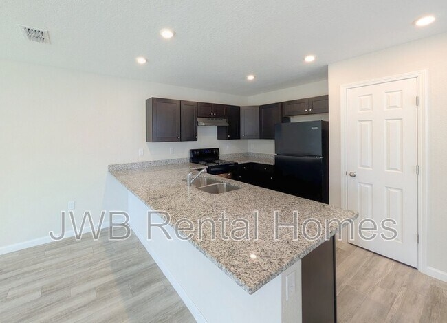 Foto del edificio - 9859 Morgan Marsh Ct