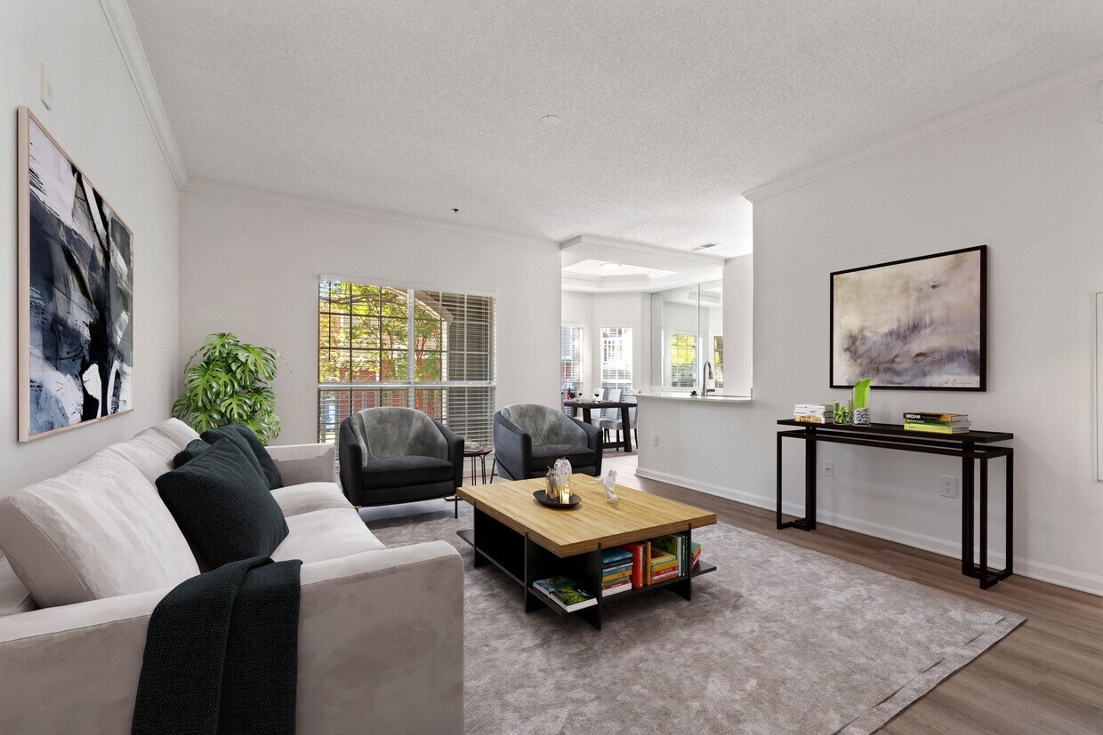 Sala de estar con grandes ventanales de piso a techo que ofrecen abundante luz. - Windsor Vinings