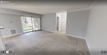 This 710 square foot apartment in Falls Church, VA offers a thoughtfully designed living space with modern amenities. The single-story layout comprises one bedroom, one bathroom, and an open-concept living, dining, and kitchen area. The interior is characterized by a light, neutral color palette, creating a bright and airy ambiance throughout.

The spacious primary bedroom, measuring 170 square feet, features plush carpeting and a large window that allows natural light to flood the space. The bathroom showcases contemporary fixtures, including a granite countertop vanity and a tiled shower area.

The heart of the home is the open-concept living area, which seamlessly integrates the kitchen, dining, and living spaces. The kitchen boasts white cabinetry, stainless steel appliances, and granite countertops, creating a sleek and functional cooking environment. A kitchen island serves as both additional counter space and a casual dining area.

The living room is bathed in natural light thanks to large windows and sliding glass doors that lead to an outdoor area. Recessed lighting and modern light fixtures throughout the apartment provide ample illumination. The neutral-toned walls and carpeting create a versatile backdrop for various decor styles.

Storage is addressed with a dedicated closet space, ensuring organization and tidiness. The apartment's efficient layout maximizes the use of its 710 square feet, offering a comfortable and contemporary living experience in a prime Falls Church location.