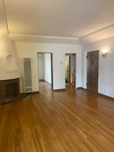 Living room bedroom door on left, vanity room on right - 126 S Maple Dr