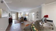 Located in Raleigh, NC, this well-appointed 3-bedroom, 2-bathroom single-floor home offers a thoughtfully designed layout that balances comfort and functionality. The open-concept living and dining area features crown molding, warm hardwood-style flooring, and large windows that invite natural light, creating an airy and welcoming atmosphere. The living room provides ample space for relaxation, with natural light filtering through elegantly draped windows.

The kitchen is equipped with dark espresso cabinetry, stainless steel appliances including a range, microwave, and refrigerator, complemented by granite countertops and a mosaic tile backsplash. A peninsula with additional counter space connects the kitchen to the main living area. The adjacent dining space features crown molding and a chandelier overhead, making it ideal for entertaining.

The spacious primary bedroom offers generous proportions, plush carpeting, a ceiling fan, and closet storage. The additional bedrooms are well-sized, each with ceiling fans and closet access. The bathrooms are finished with tile flooring, granite vanity countertops, and shower-tub combinations. A central hallway connects all rooms efficiently, and two closets provide practical storage throughout the home.