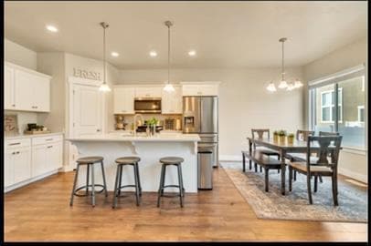 Building Photo - Beautiful Townhouse located in the Edge Ex...