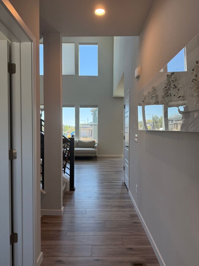 Building Photo - Stunning Luxury Living in Coal Creek with ...