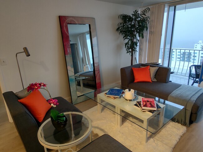 Furnished Living room with Bay and Downtown views - 7601 E Treasure Dr