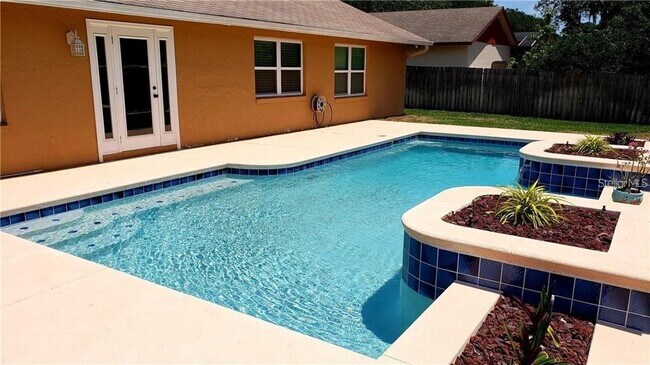 Building Photo - 9126 Sabal Palm Cir