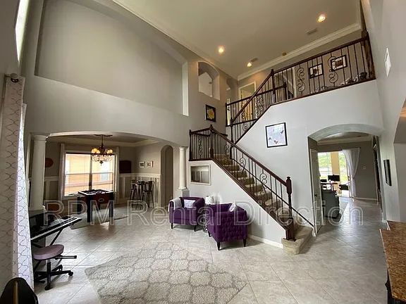 Foto del edificio - 5-Bedroom Lakefront Pool Home with Spa in Gated Promenade East at The Forum