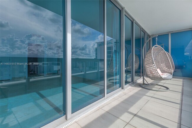Building Photo - 6899 Collins Ave