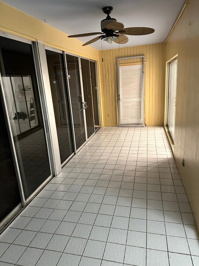 downstairs screen porche - 3115 N Palm Aire Dr Townhome