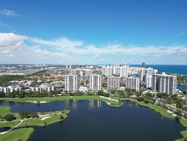 Building Photo - 3675 N Country Club Dr