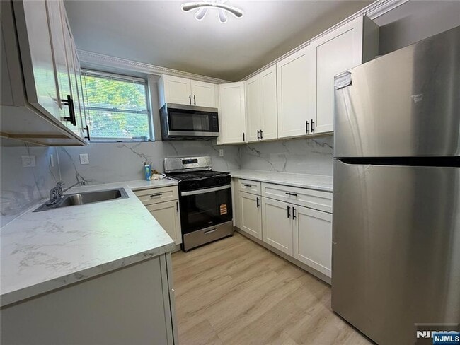 Photo - 9066 Palisade Plaza Unit House