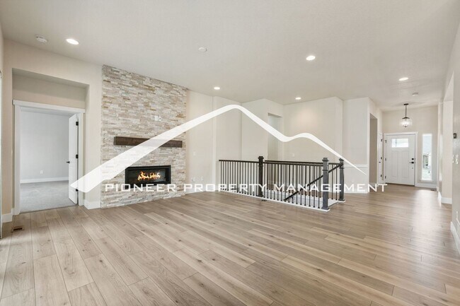 Building Photo - Main Floor Primary Home in Flying Horse with 5 Bedrooms, Gourmet Kitchen, Finished Basement & 4-C...