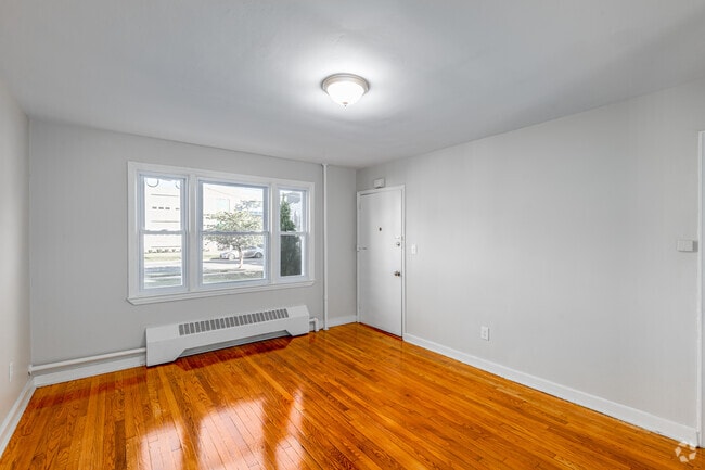 2BR, 1BA - 686SF - Living Room - Mapleview Apartments