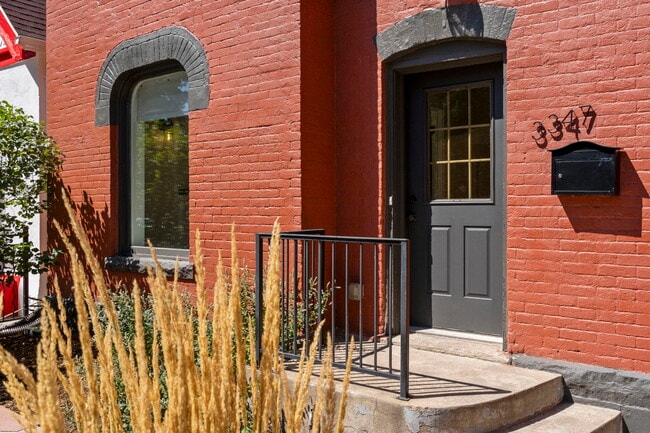 Front porch just beyond the patio. - 3347 Tejon St