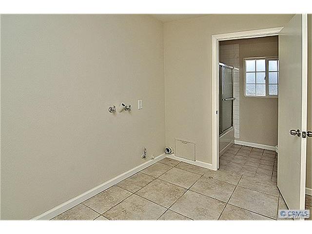 Laundry and bath - 10969 Sharp Ave