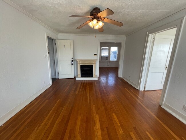 Building Photo - Charming 1 Bed + Bonus Room Near Cultural District — Hardwoods, Fireplace & Sunroom!