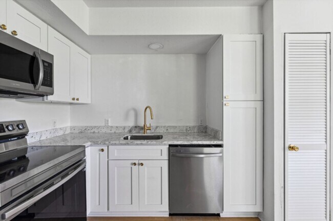 Building Photo - LEASE TERMS NEGOTIABLE Newly Remodeled One...