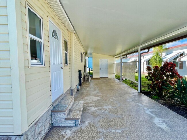 Building Photo - 2 BR 2 Bath Annual Rental in Barefoot Bay ...