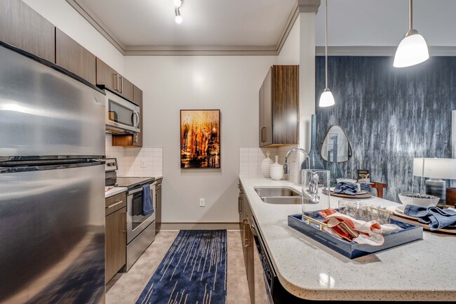 Energy-Efficient, Stainless Steel Appliances and Quartz Countertops - Cortland Midtown East