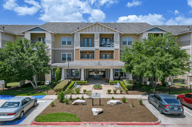 Building Photo - Belle at Bay Colony 55+ Apartments
