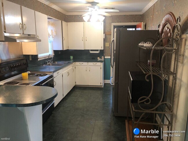 Foto del edificio - 4 br, 1.5 bath House - 355 N Cornell Ave