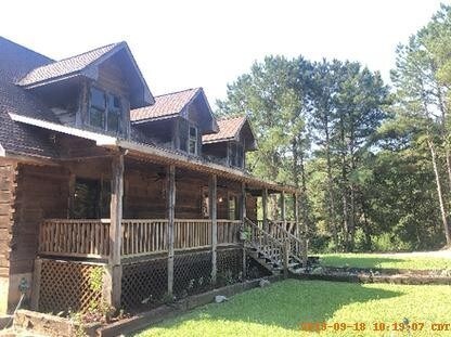 Building Photo - Secluded Log Cabin with a view of horses!