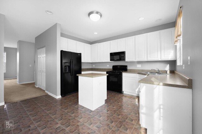 Building Photo - 2 Bedroom 2.5 Bath Townhome in Heron Bay S...