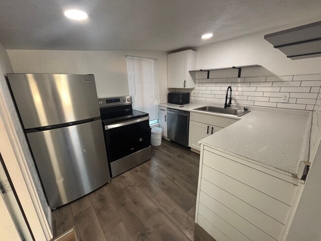 Building Photo - Brand New Updated studio home is a must se...