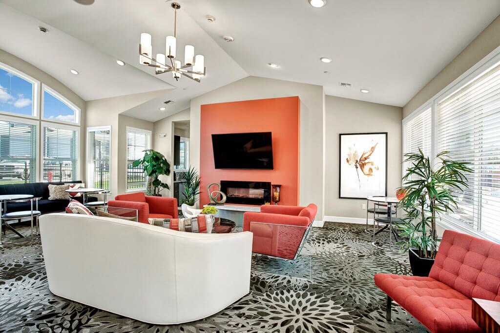 Solara Apartments Moses Lake Wa A Large Shared E With Couches Chairs Flat Screen Tv And Fireplace