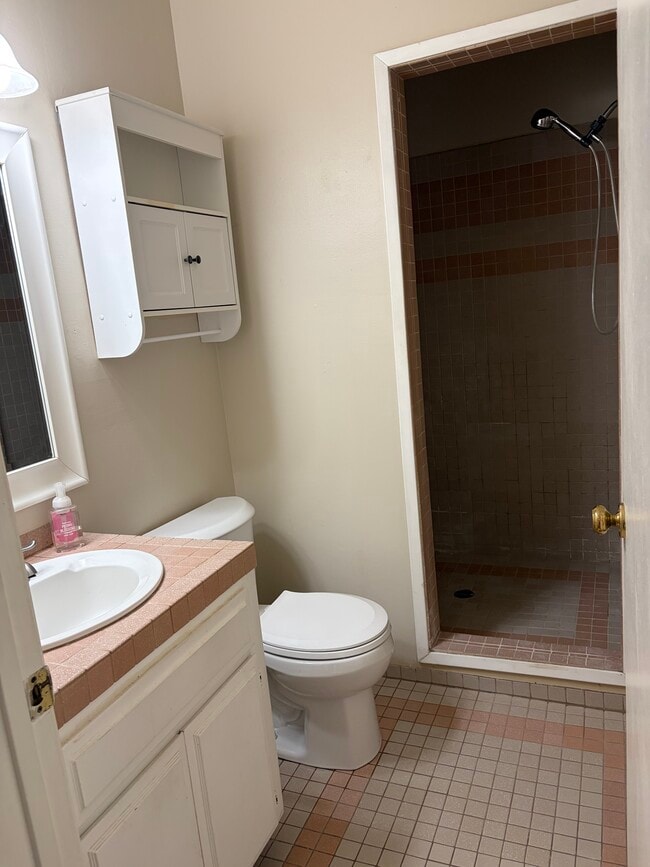 Bathroom with shower. - 665 Rim Rd