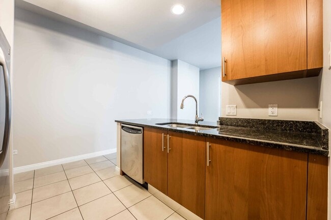 Building Photo - Welcome to luxury living in the heart of L...